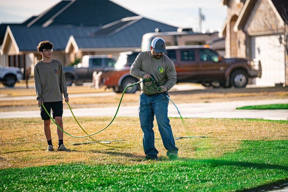 Bold Gold crew working a healthy green lawn
